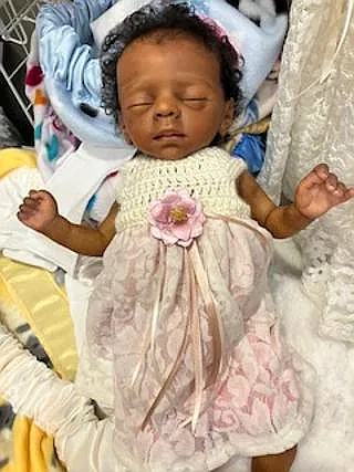 One-of-a-kind crocheted yoke w/ fabric skirt